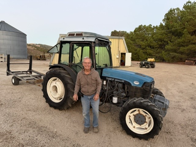 Arnold Klintworth with his tractor